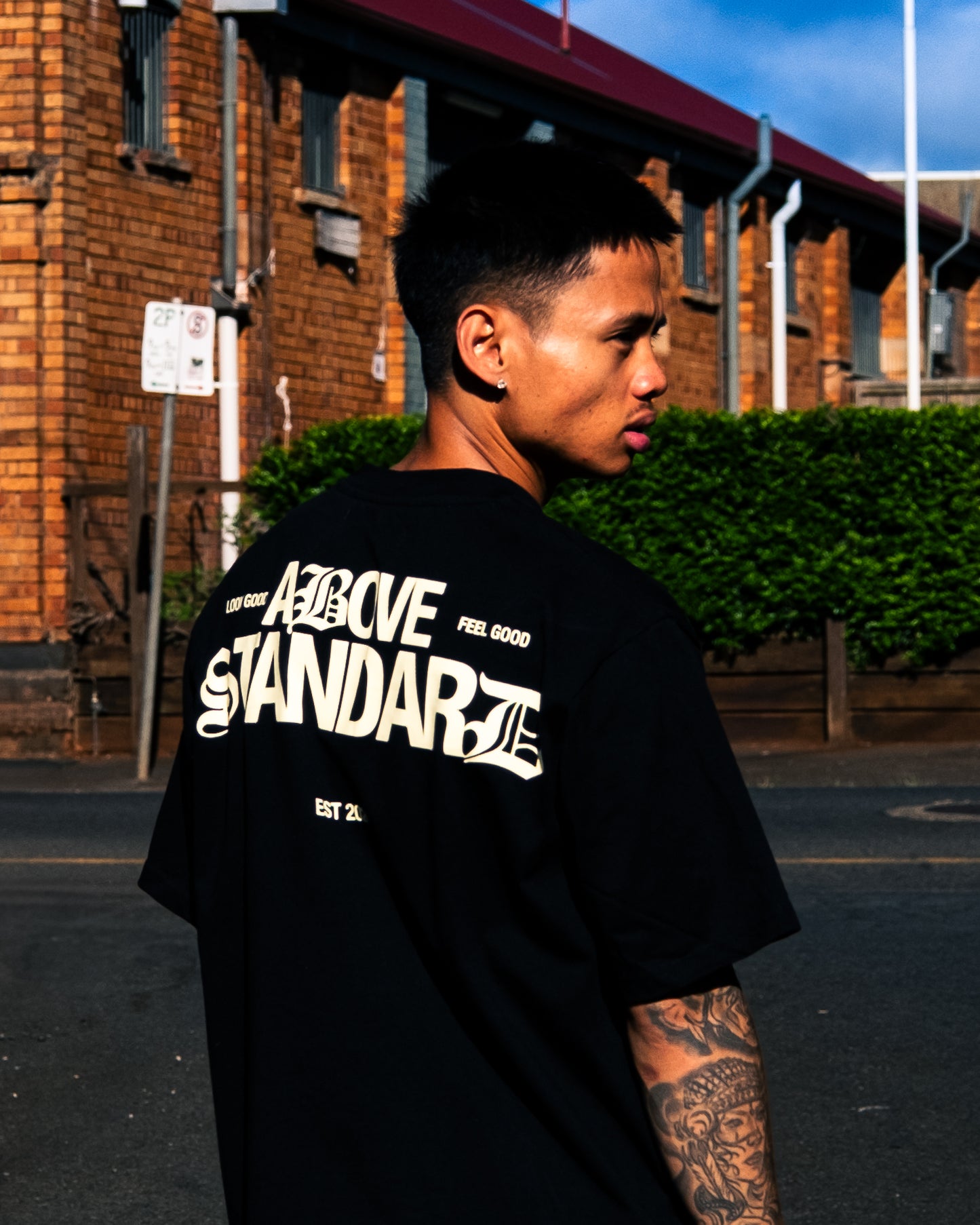 “Above Standard Tee”